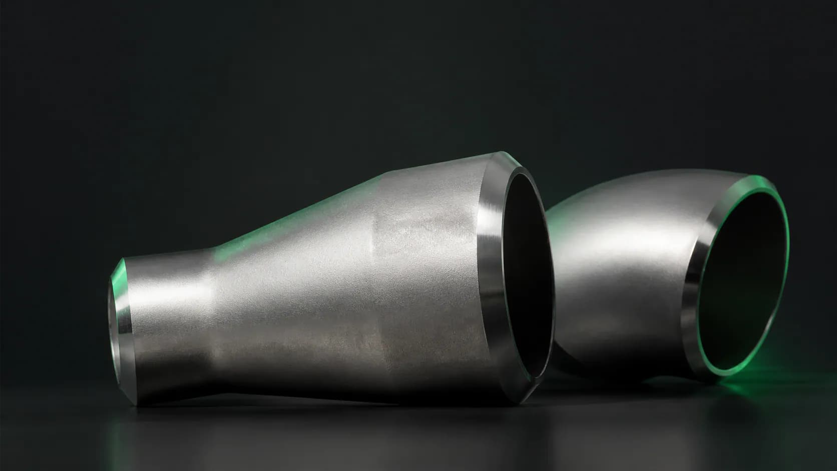 Illustrative Incoloy 825 alloy reducer and elbow pipe fittings