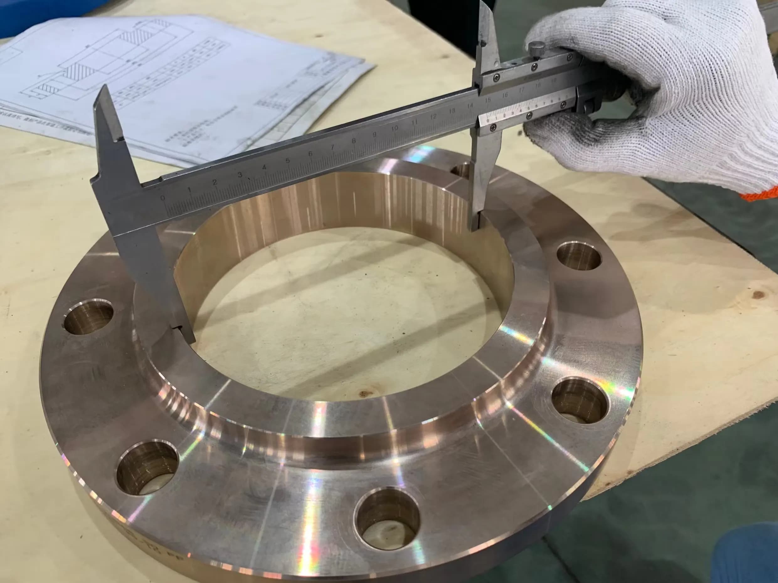 Vernier caliper used to inspect a finished alloy flange