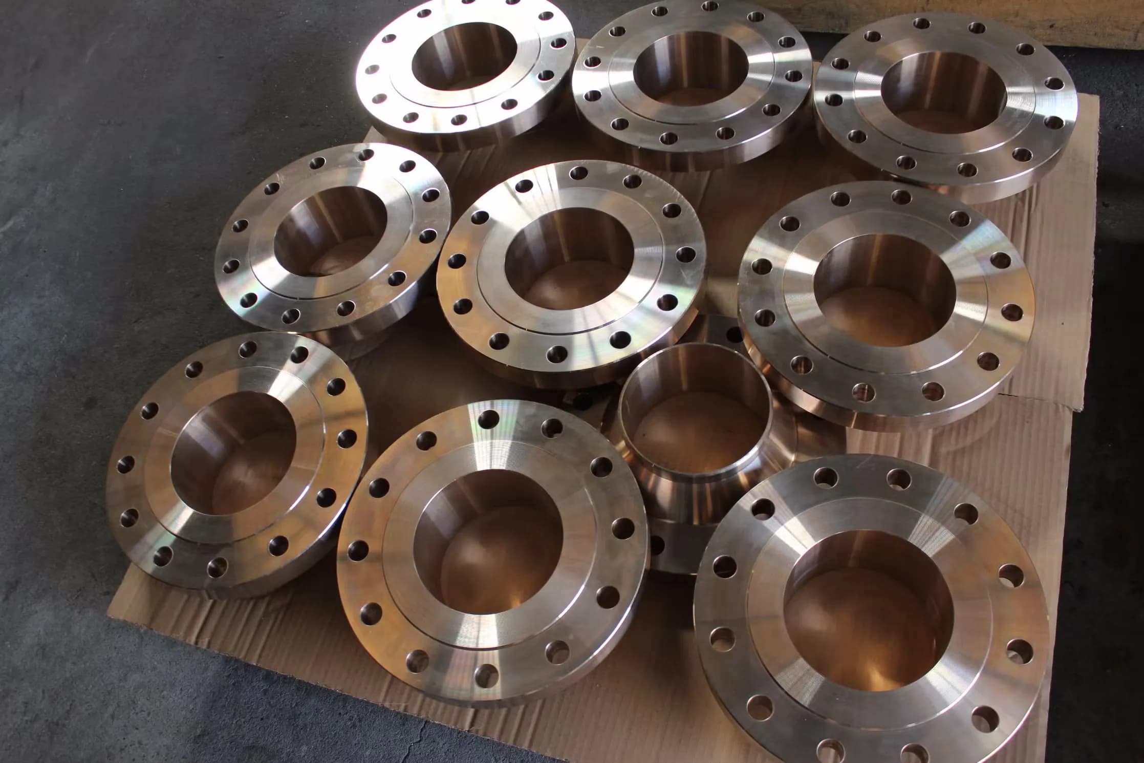 Finished machined alloy flanges arranged for product review