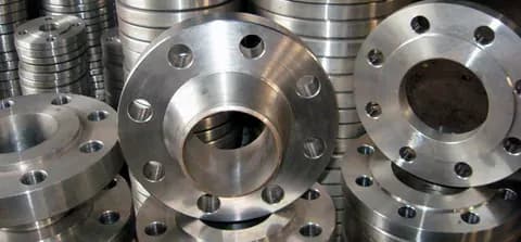Machined alloy flanges with raised faces and bolt holes